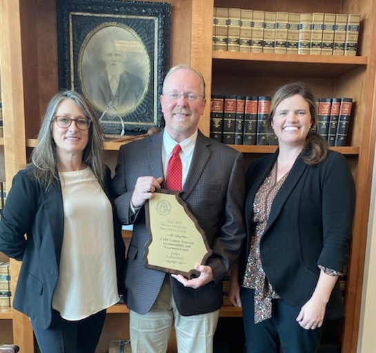 Judge Kell with Ramona Burkett and Katelyn Parker