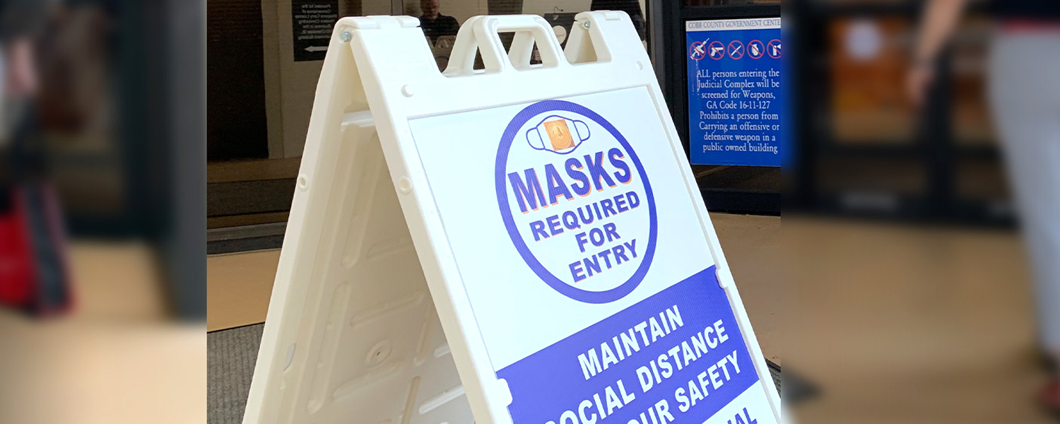 Photo of a sign stating masks required.