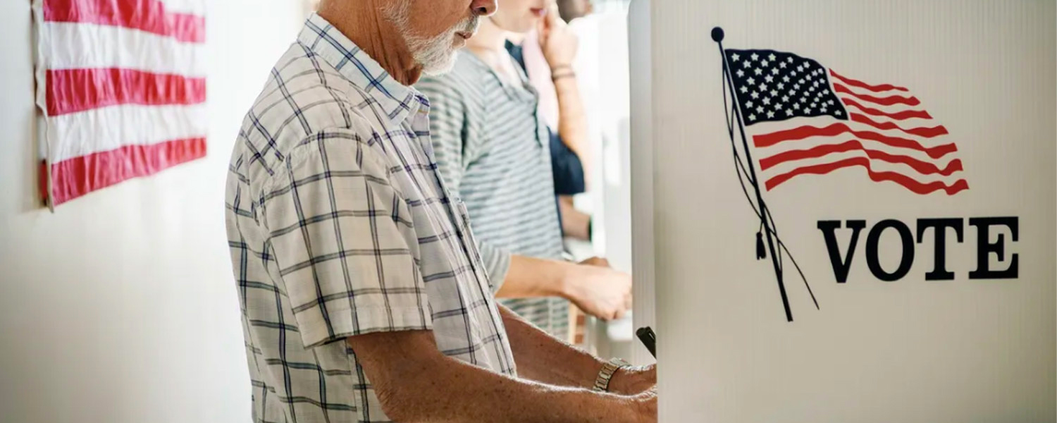 picture of voters in booth