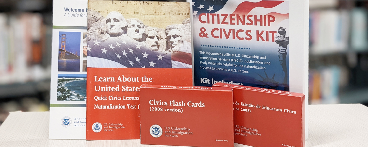 a Citizenship Kit on displaying; the kit includes a binder, 2 booklets, and 2 sets of flashcards