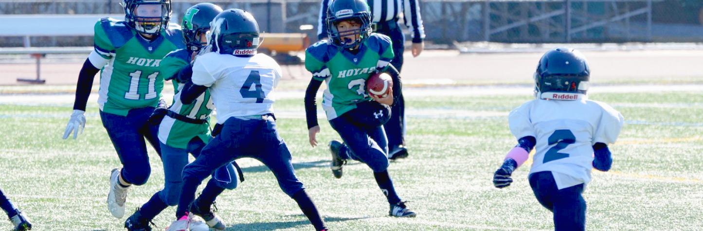 Photo of youth playing football.