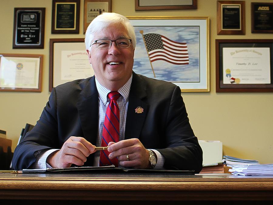 Former Chairman Tim Lee Sitting Desk