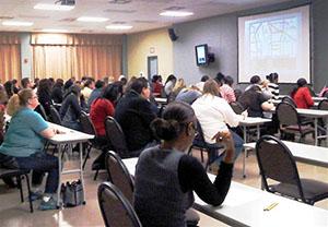 Image of people taking an exam