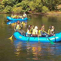 Kids on rafts in lake