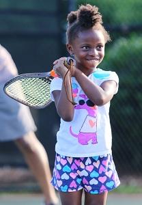 This is a photo of a girl playing tennis