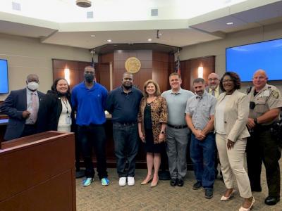 DTC graduates with staff