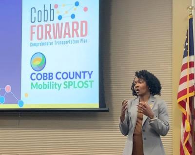 Chairwoman Cupid speaking before transportation leaders