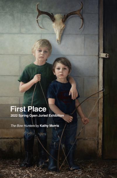 Two young bows facing straight forward, holding arrows with a deer skull hanging above them.