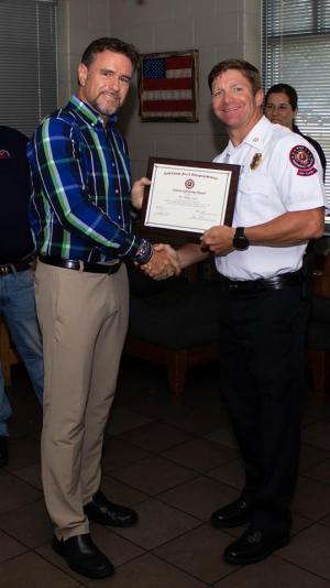 Dr Mike Laur Receiving Citizen Lifesaver Award