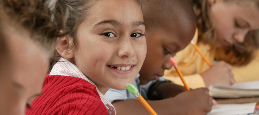 young students with pencils and paper