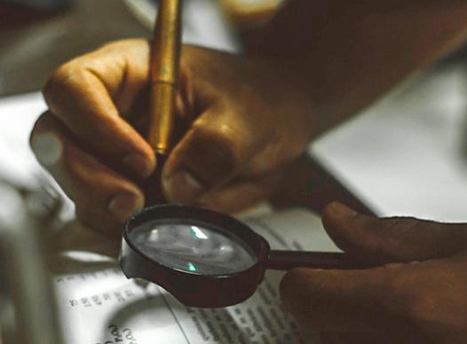 Magnifying Glass and Fountain Pen