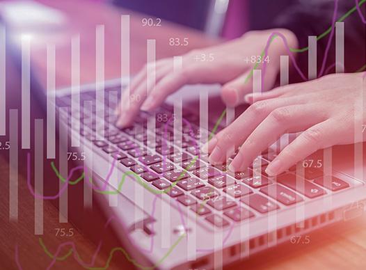 Hands Typing with Chart Overlay