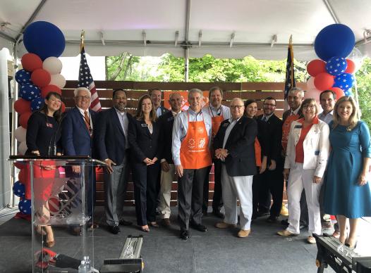 Photo of stakeholders at the Home Depot Board Cutting Ceremony