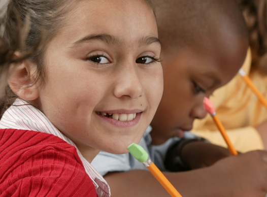 young students with pencils and paper