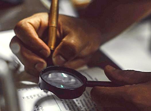 Magnifying Glass and Fountain Pen