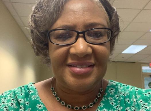 Woman with glasses, head shot