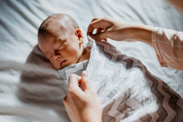 Newborn gets discount out of swaddle