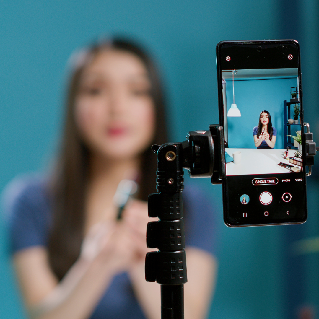 a person making video content