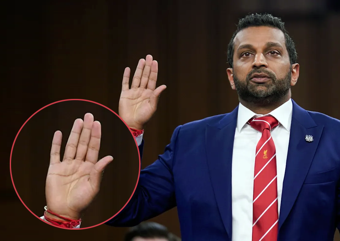 FBI Director Kash Patel with Hand Up