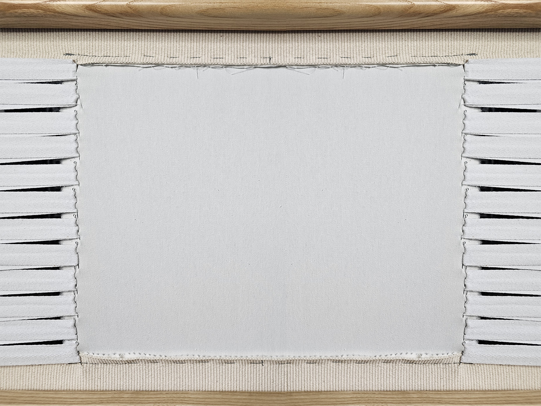 tap the fabric to ensure it’s drum-tight.