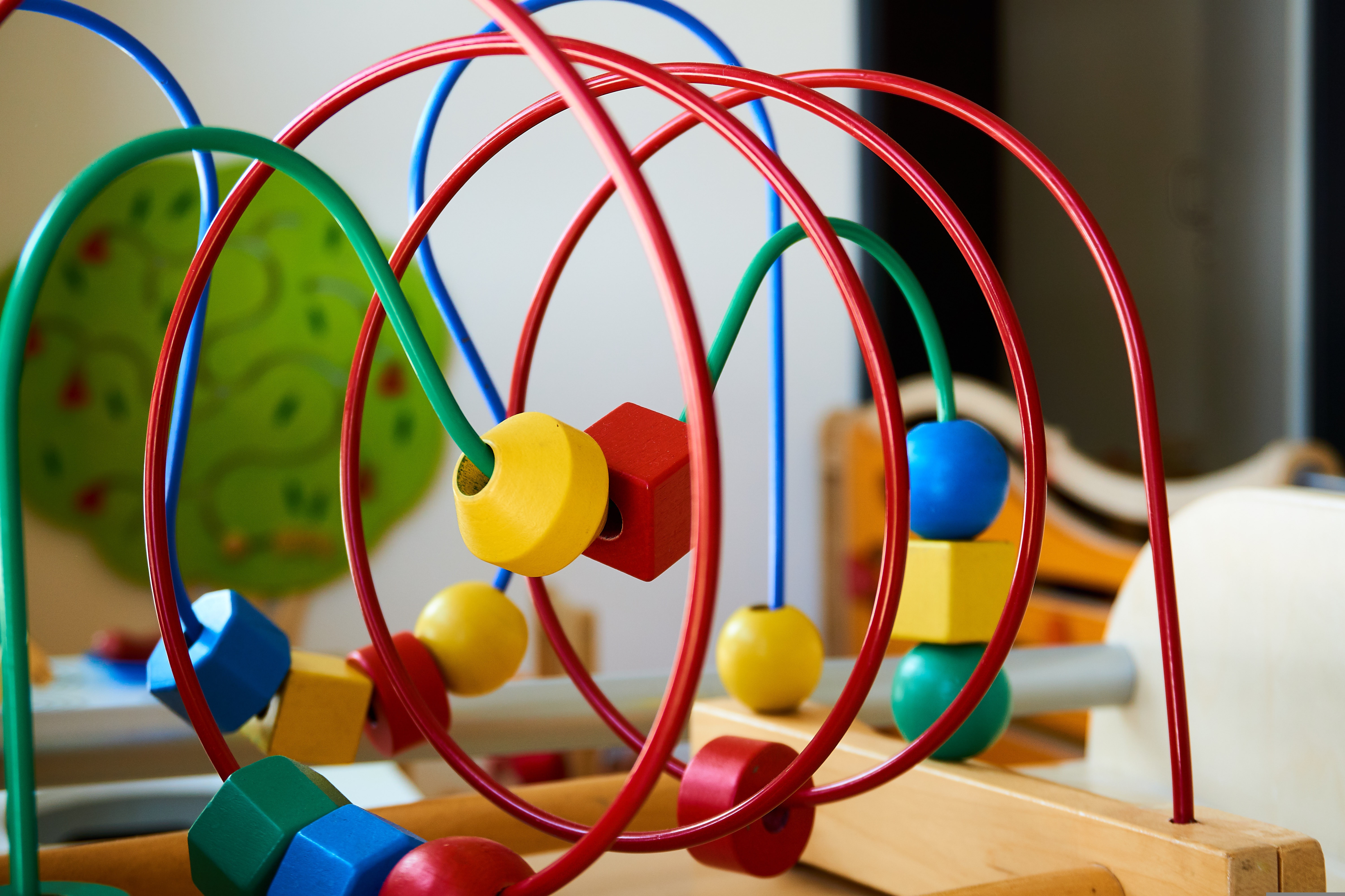 a colourful child's wire toy