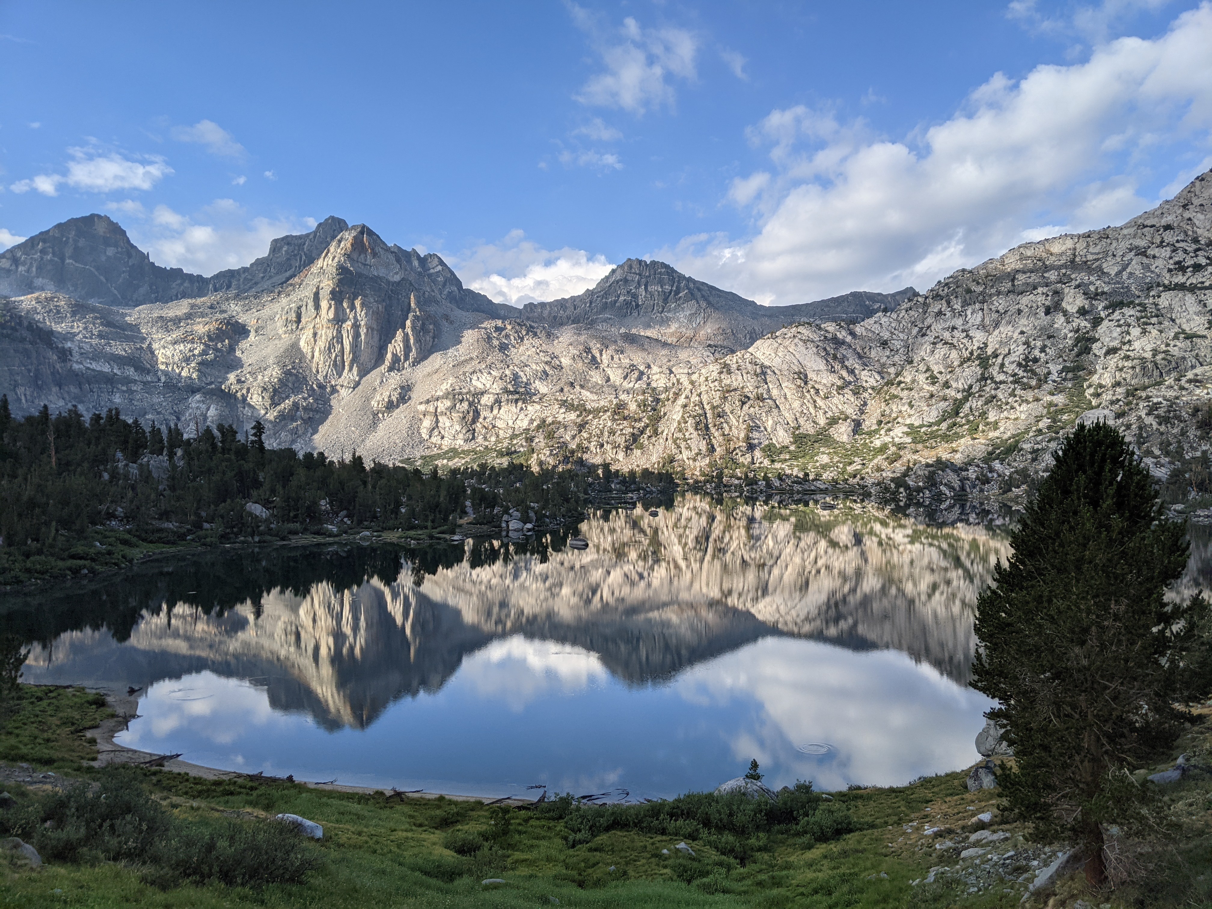 picture of a mountain reflected in a lake