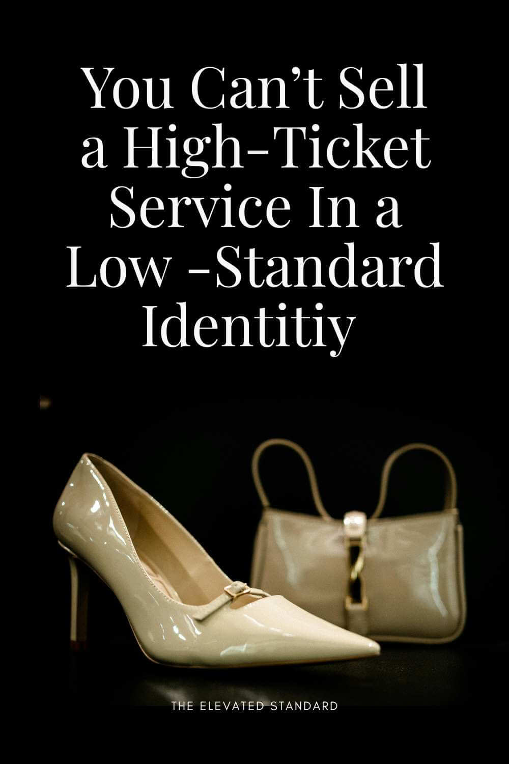 Luxury Pinterest pin for entrepreneurs. Text reads "You can't sell a high-ticket service in a low-standard identity." Minimalist workspace with luxury  accessories.