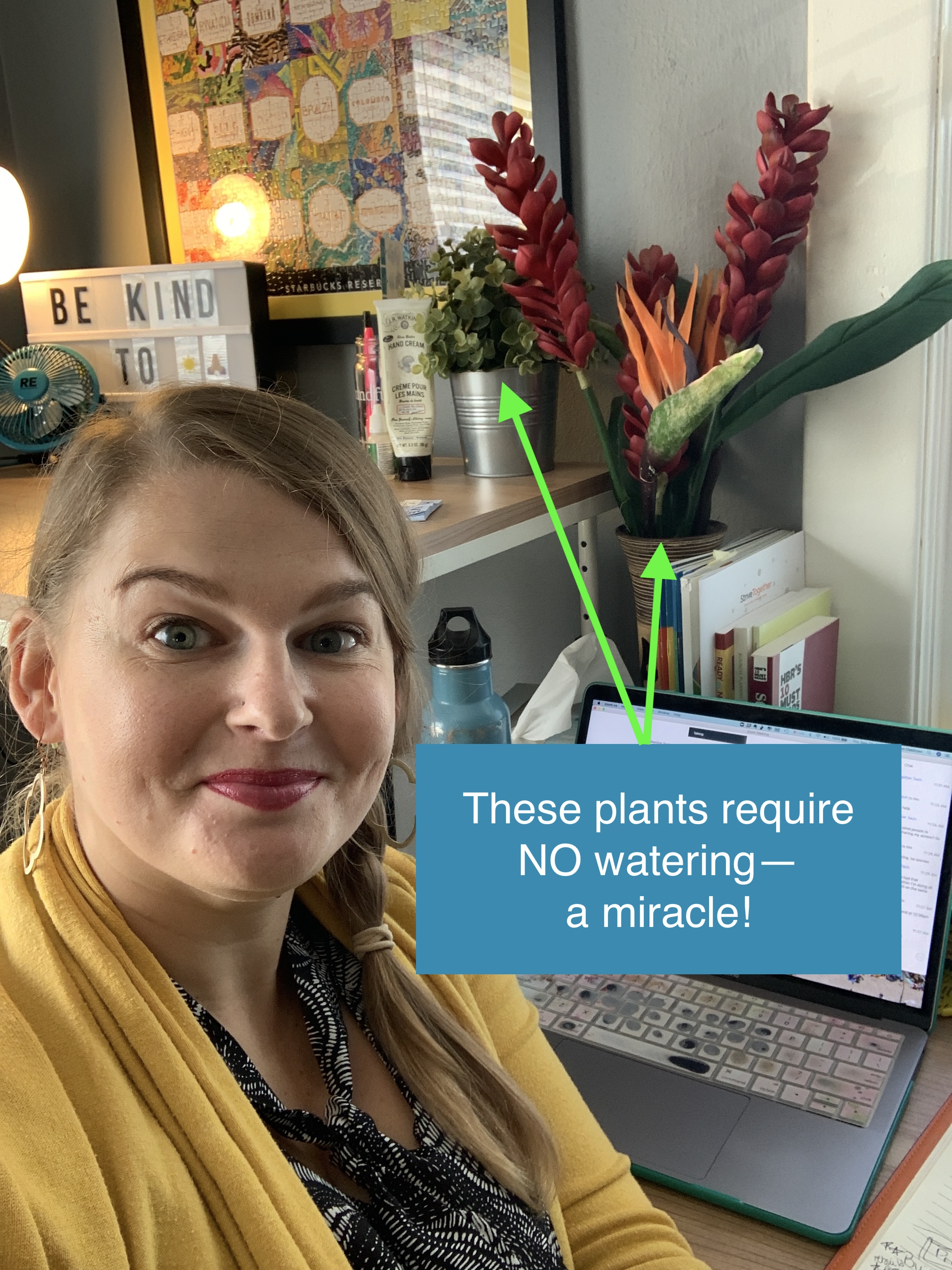 Selfie of younger Lynn with plants in the background and caption "These plants require NO watering--a miracle!"