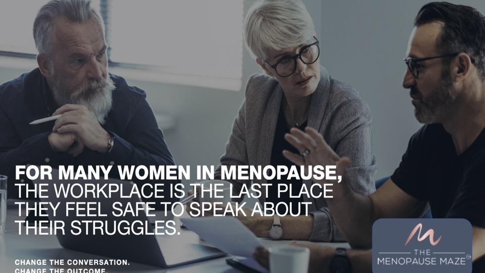 A single woman in the boardroom feeling unsafe to disclose her menopausal status to male peers in the financial services sector.