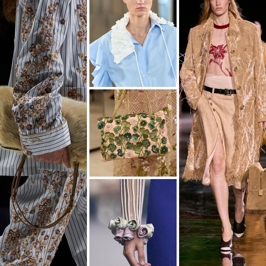 Spring/Summer 2026 runway details showing floral embellishment used as placed elements: embroidered flowers concentrated on striped tailoring, a single floral appliqué at the shoulder of a shirt, dense floral beadwork on a structured handbag, three-dimensional fabric flowers applied at a cuff, and floral embroidery positioned on a sheer top and outerwear rather than used as all-over pattern.