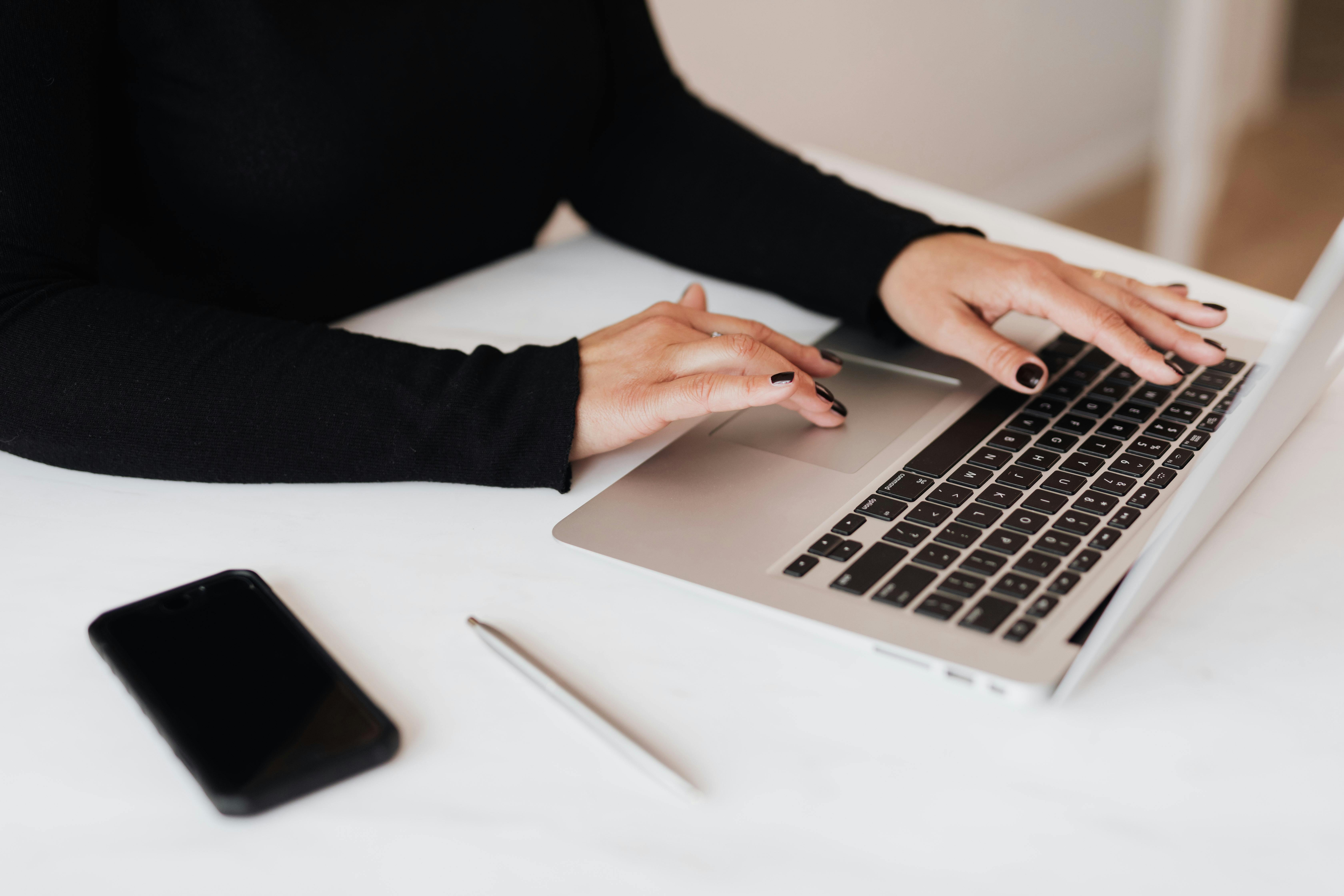 women working on her laptop