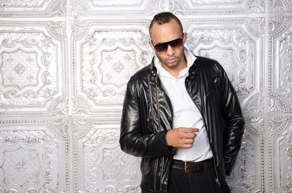 Cauveé the rockstar with shades and black leather outfit