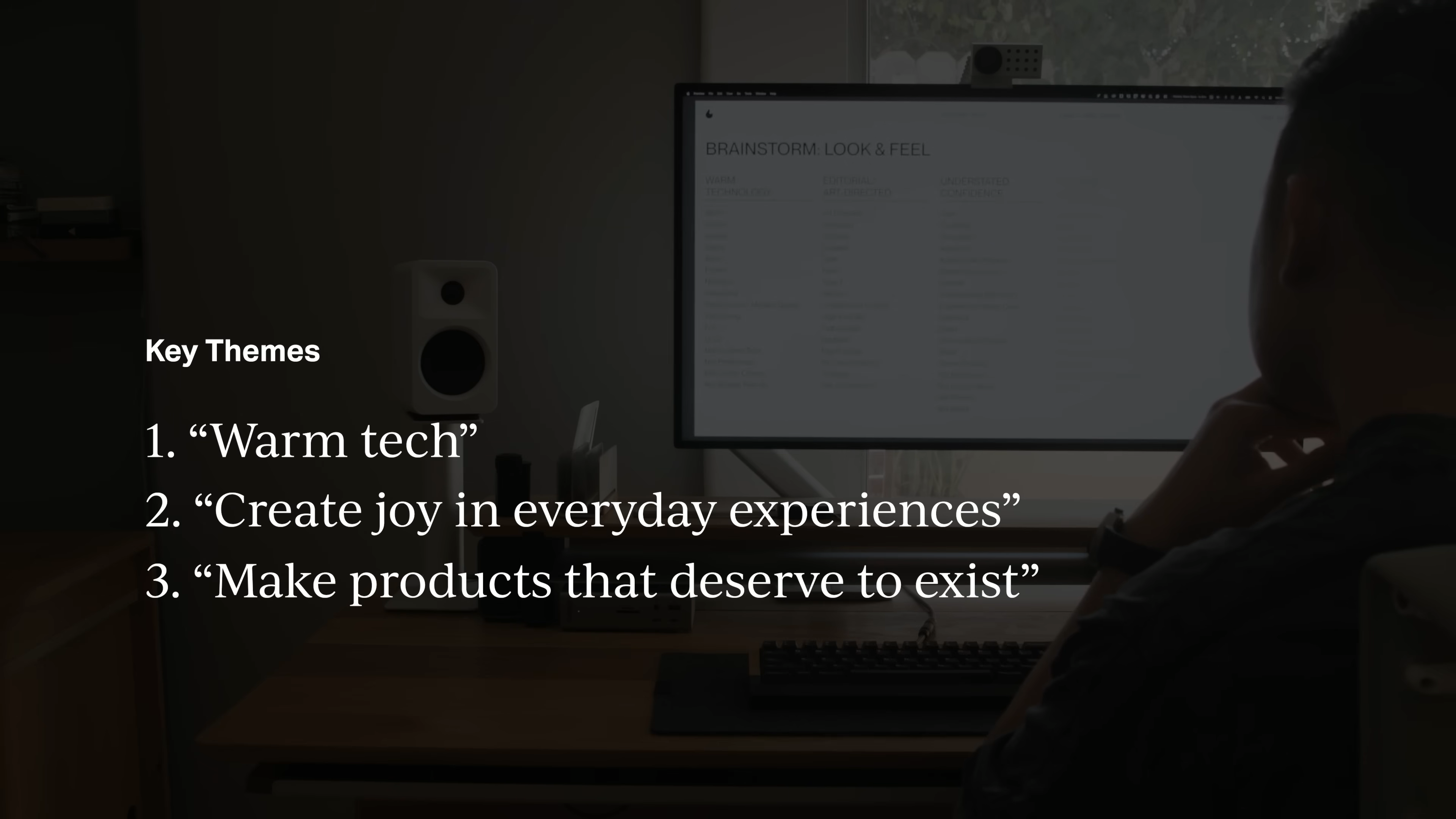 Computer screen displaying Mode’s rebrand key themes: “warm tech,” “create joy in everyday experiences,” and “make products that deserve to exist,” from Matthew Encina’s branding video.