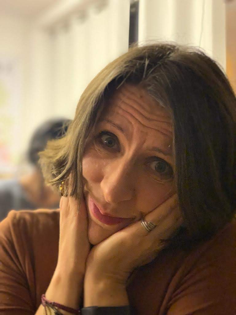 Woman looking frazzled, tired, overwhelmed. Caucasian, middle age, fifty's, manopause, perimenopause