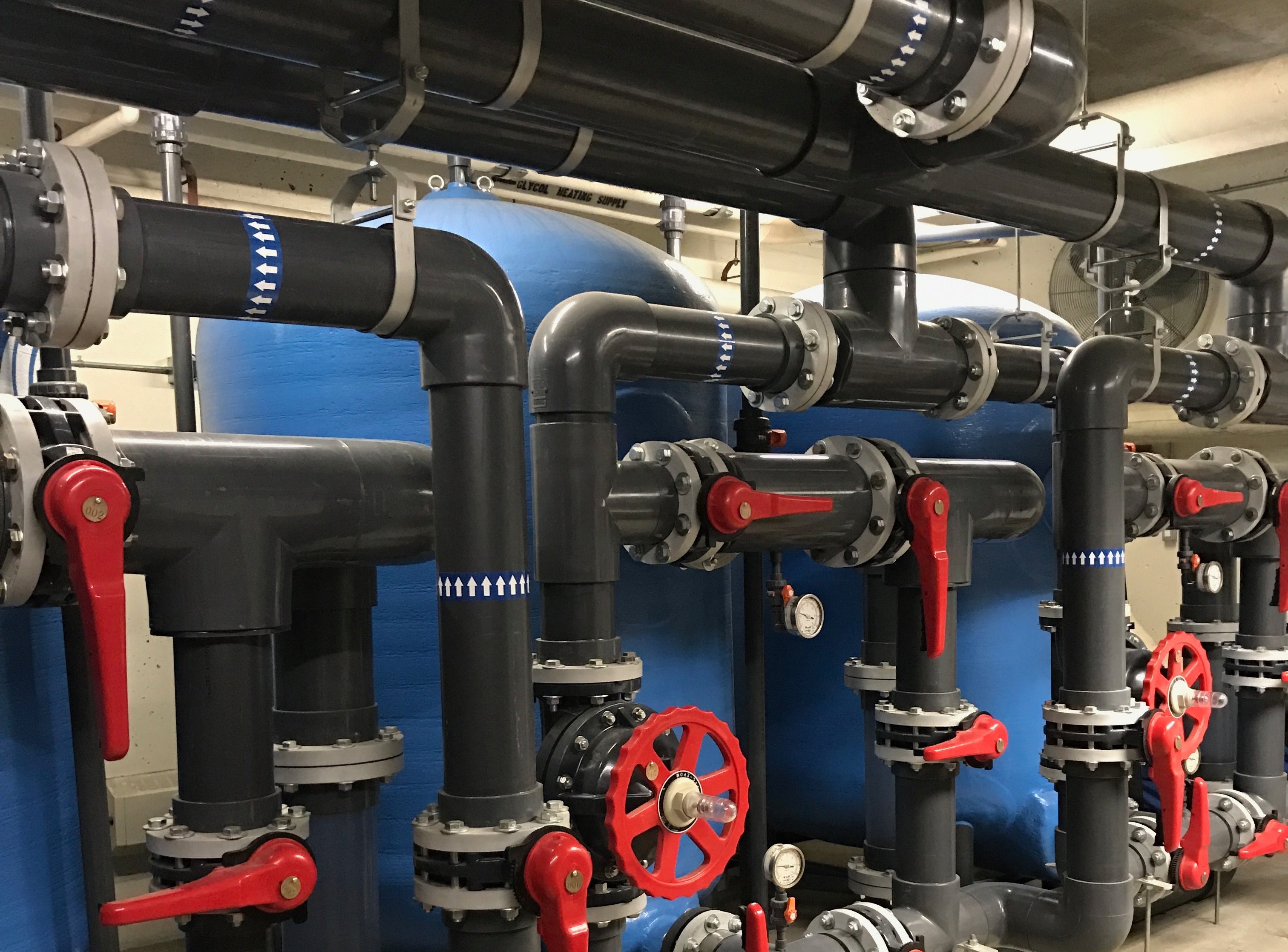 A photo of a commercial pool filtration system