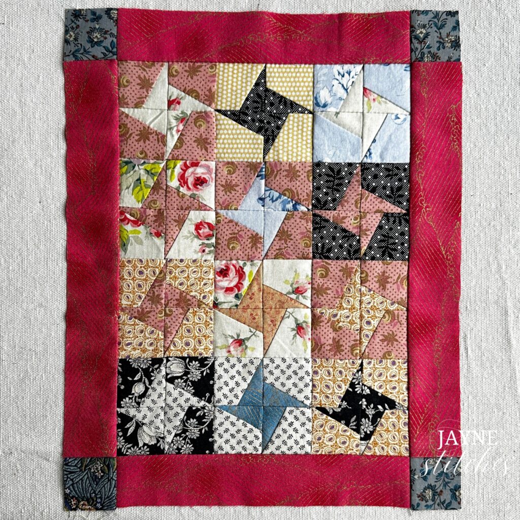 swirling stars doll quilt