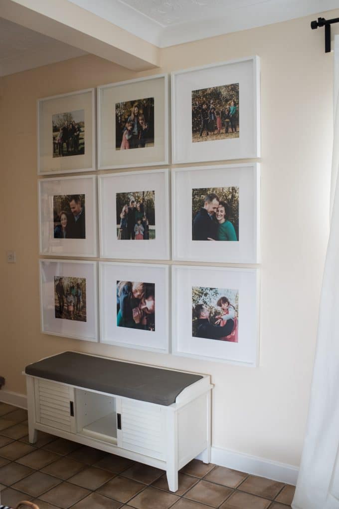 Photo wall with 12x12 IKEA frame holding family photos. Looking at home decor helps pick family photo outfits