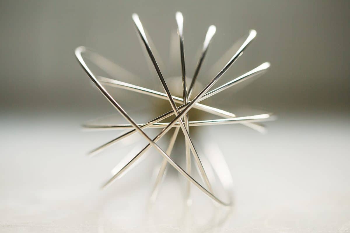 A front on view of a wisk mostly not in focus.