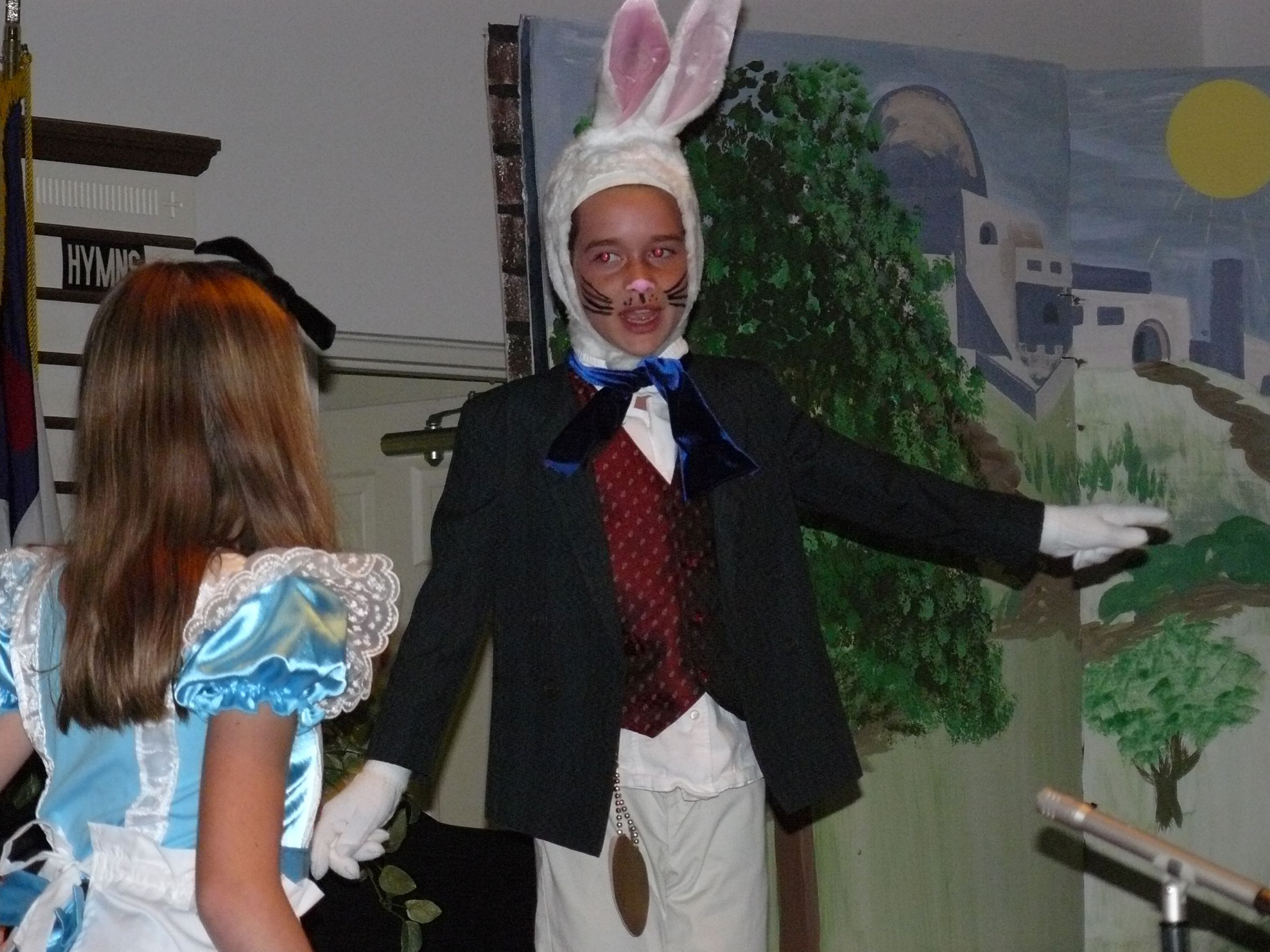 Students performing Alice's Adventures in Wonderland - homeschooldrama.com
