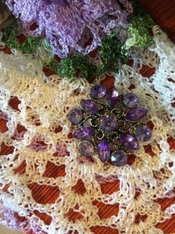 "Will you let me hold the brooch for one minute, Marilla? Do you think amethysts can be the souls of good violets?" (Ch 13)