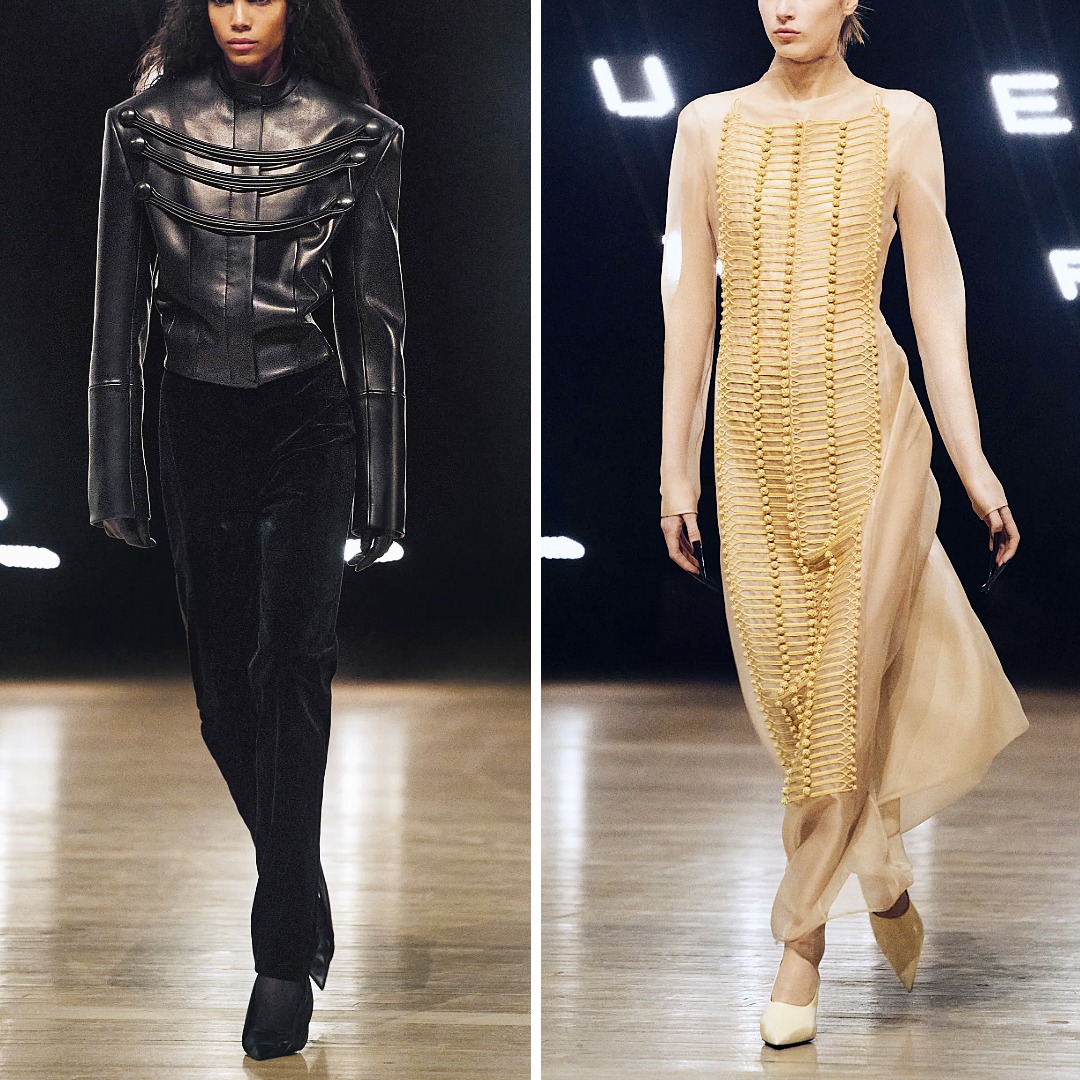 Khaite Fall/Winter 2026: the black leather York Jacket with hand-embroidered cording and covered buttons, and the sheer silk-organza Toldo Dress hand embroidered with military-inspired gold cording and soutache buttons