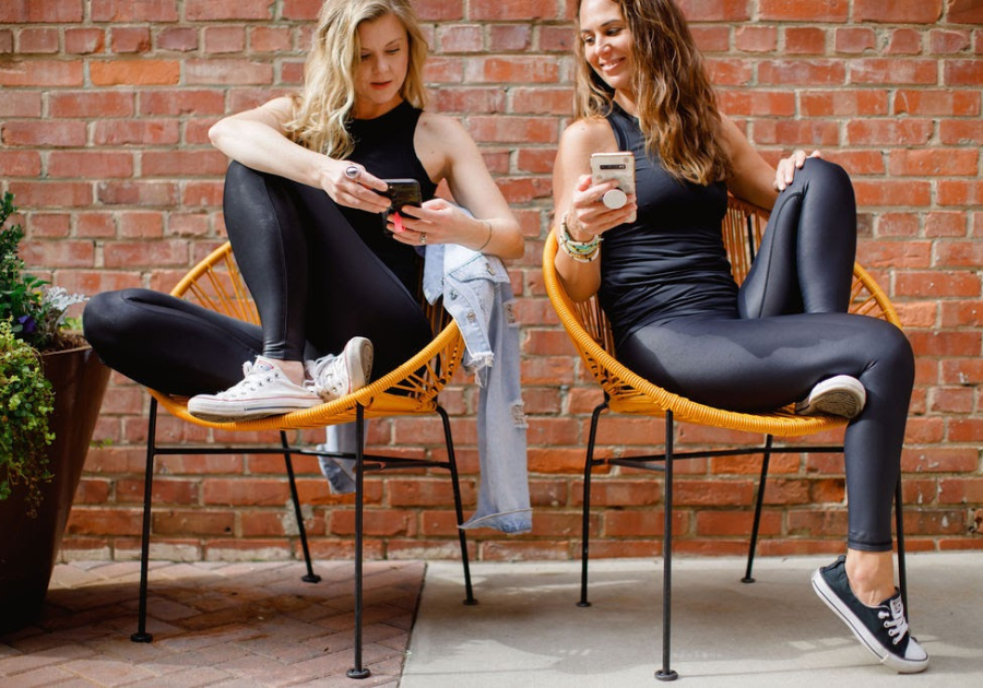 Andrea and Melissa sitting around chatting