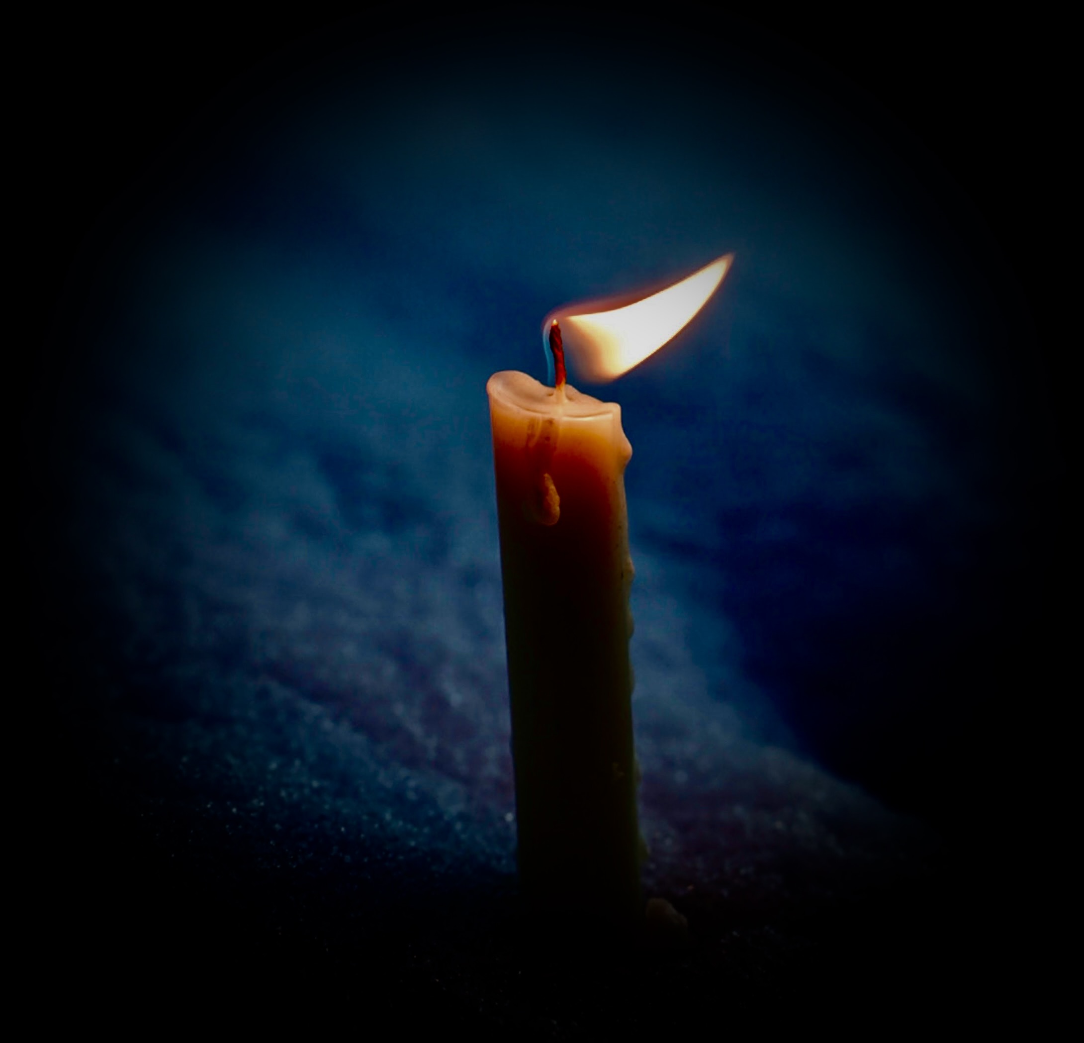 Photo by Ayse ela dikye: https://www.pexels.com/photo/wax-candle-burning-in-snow-16268622/