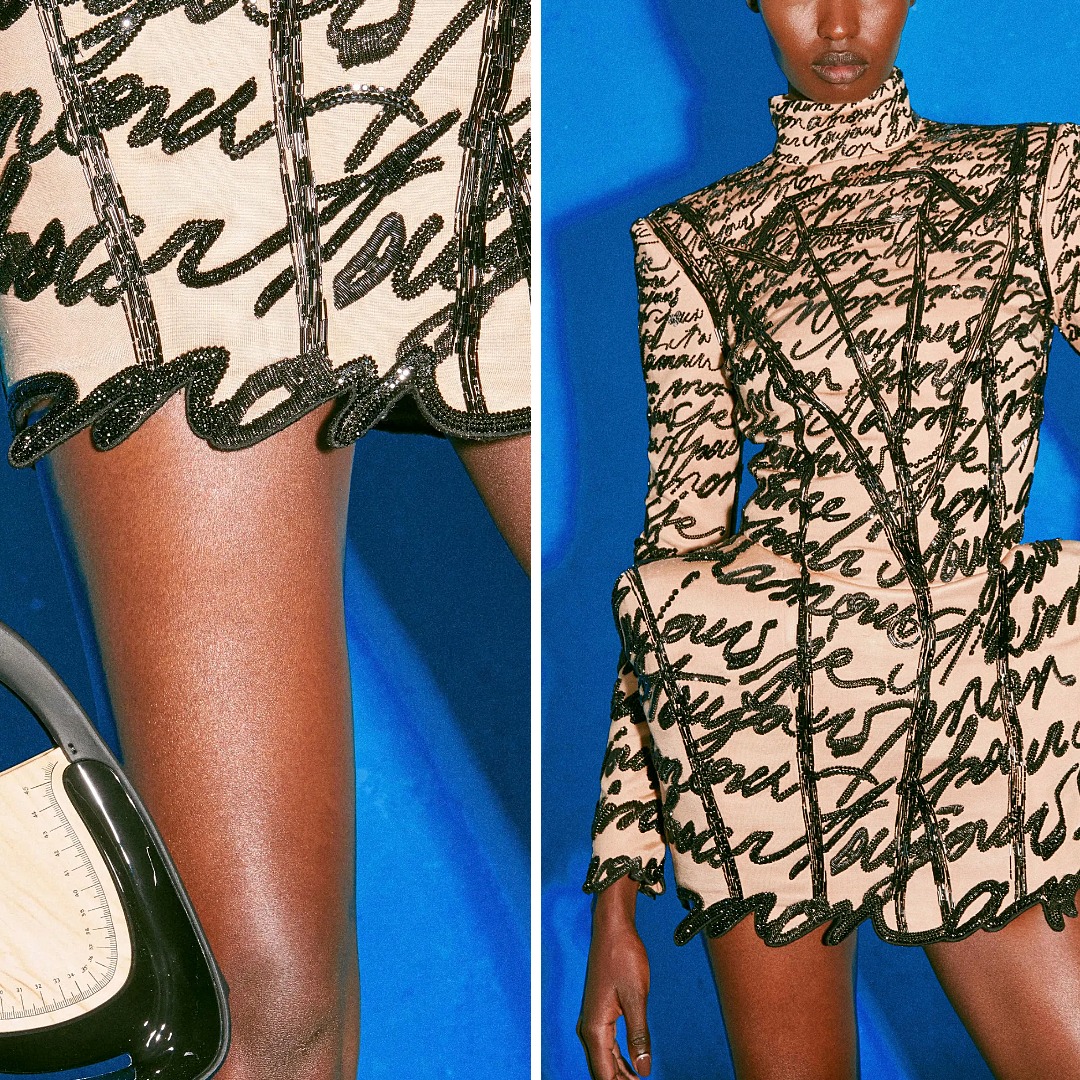 Balmain Resort 2025 dress covered in repeated “Amour” script embroidered with bugle beads, sequins, and bullion.