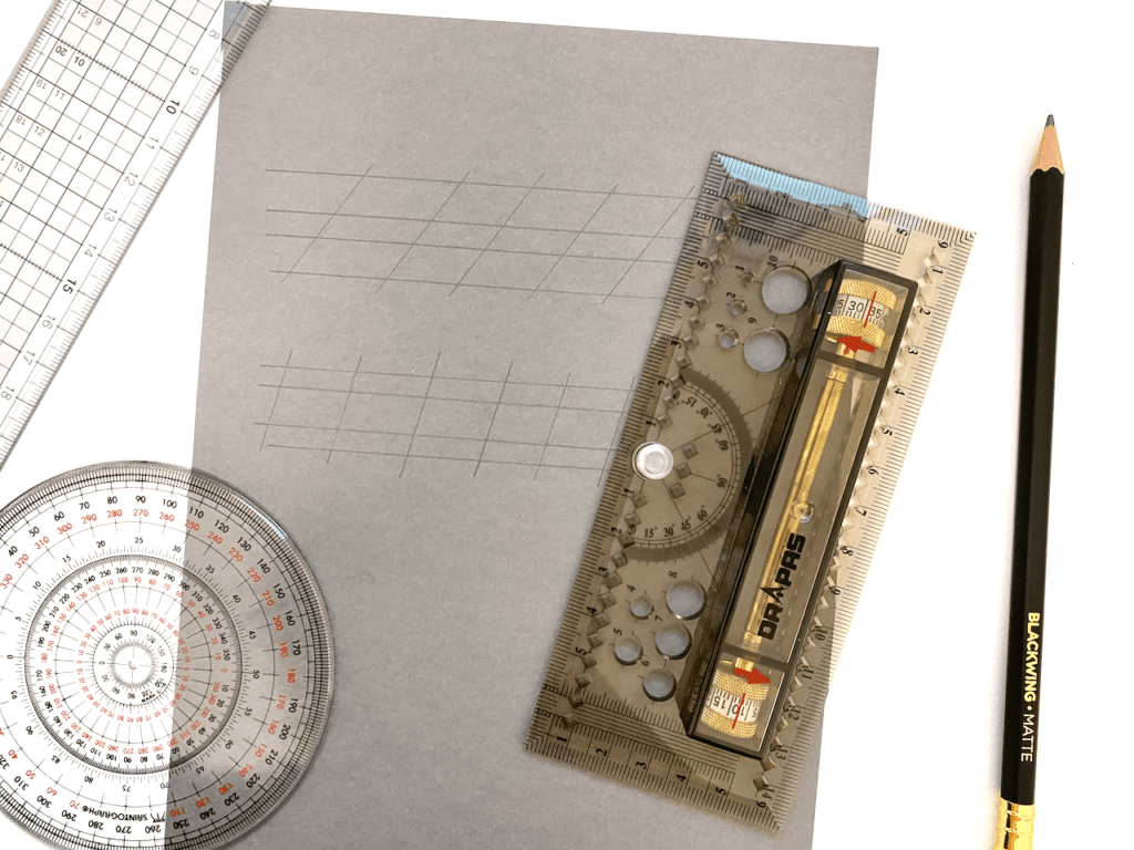 Drawing calligraphy guidelines with a pencil, ruler, protractor, rolling ruler
