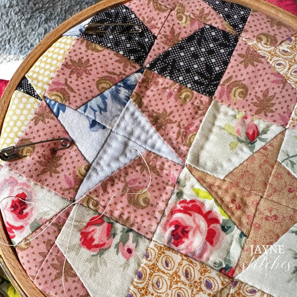 swirling stars doll quilt