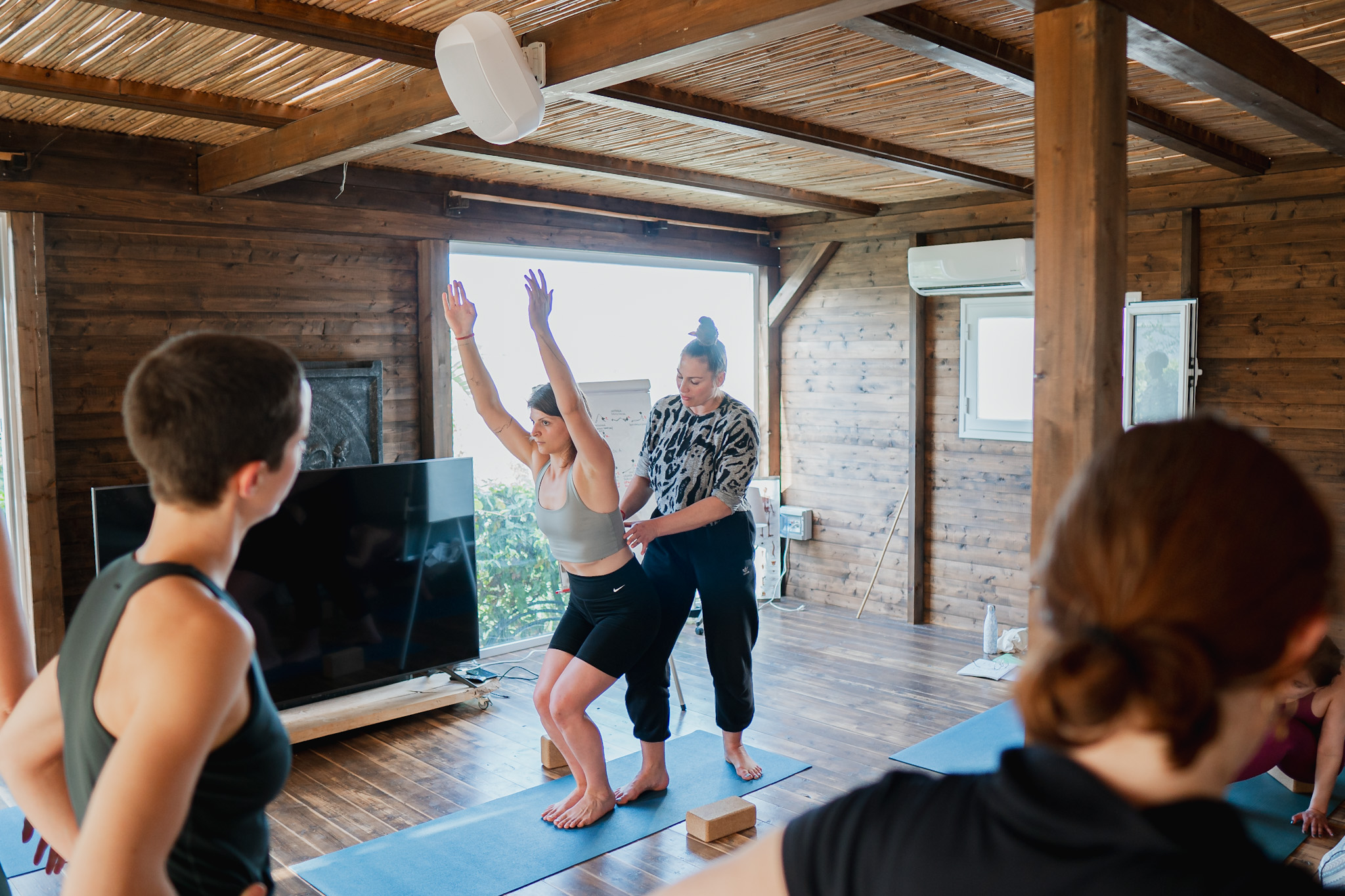 yoga hands on adjustment