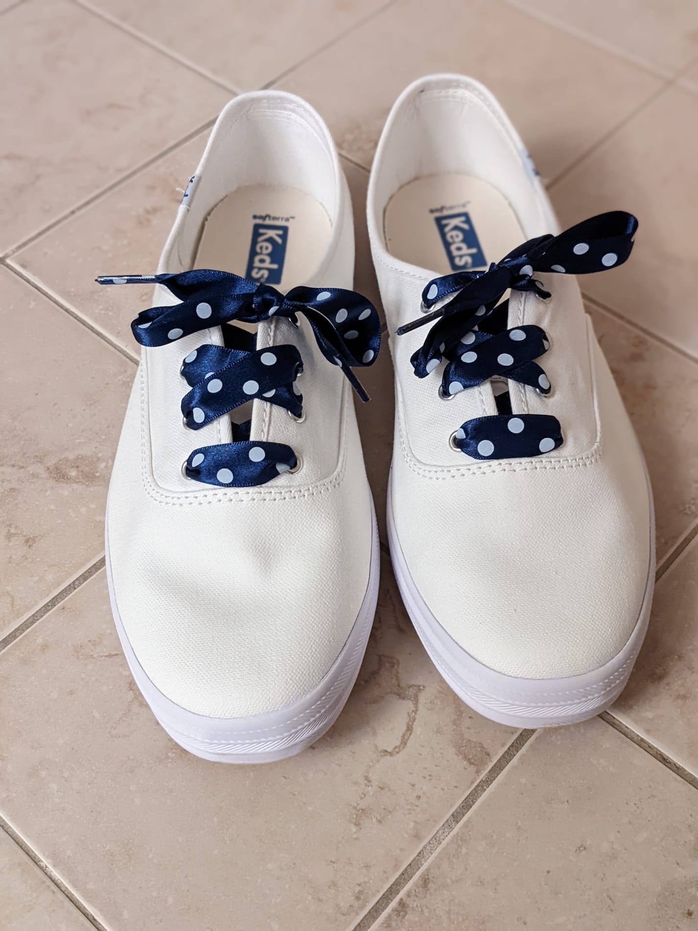 White keds sneakers with blue & white polka dot laces