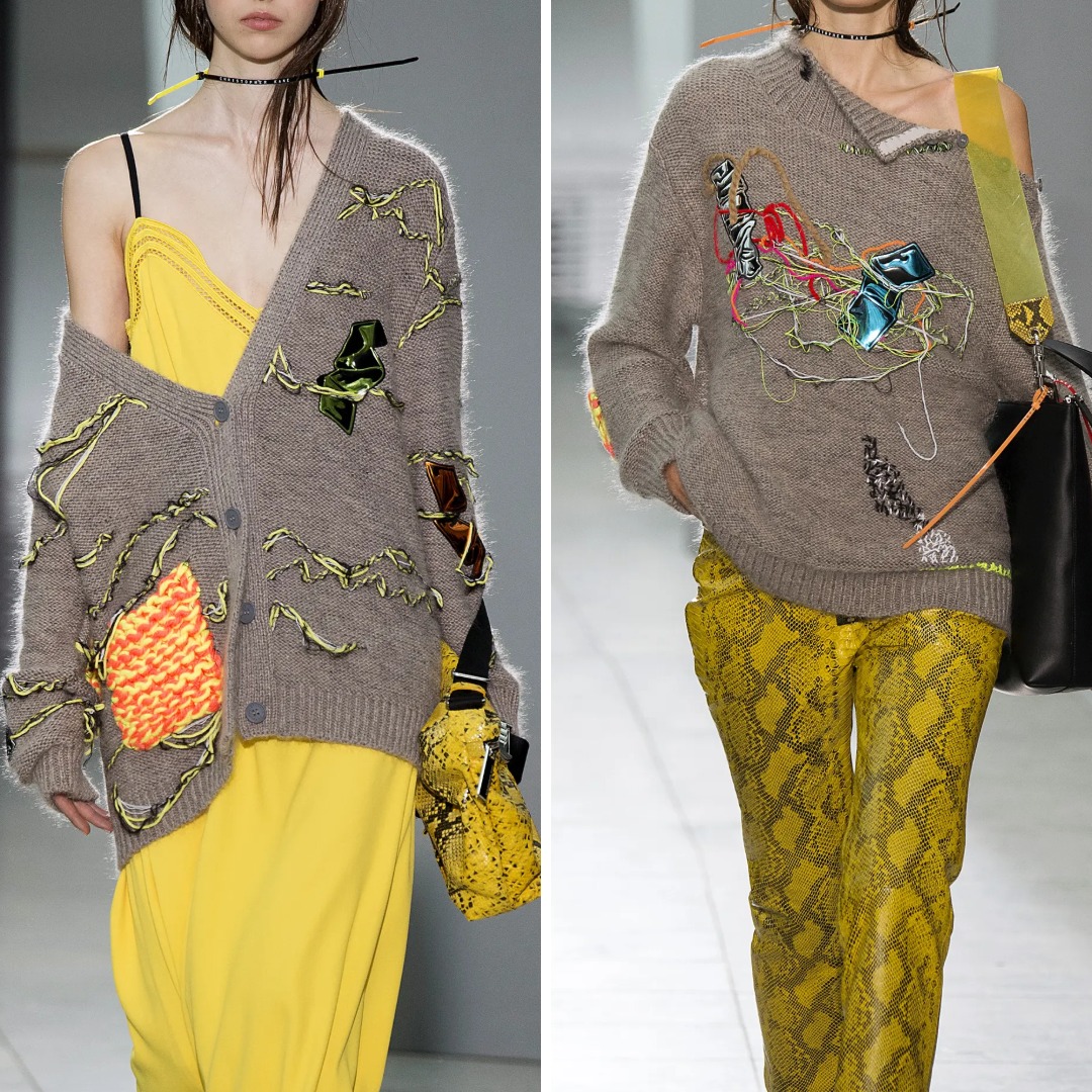 Knitwear by Christopher Kane featuring embroidery with loose threads, applied elements, and visible construction. The surface is intentionally unsettled, with stitches and materials left exposed rather than fixed into a stable composition.