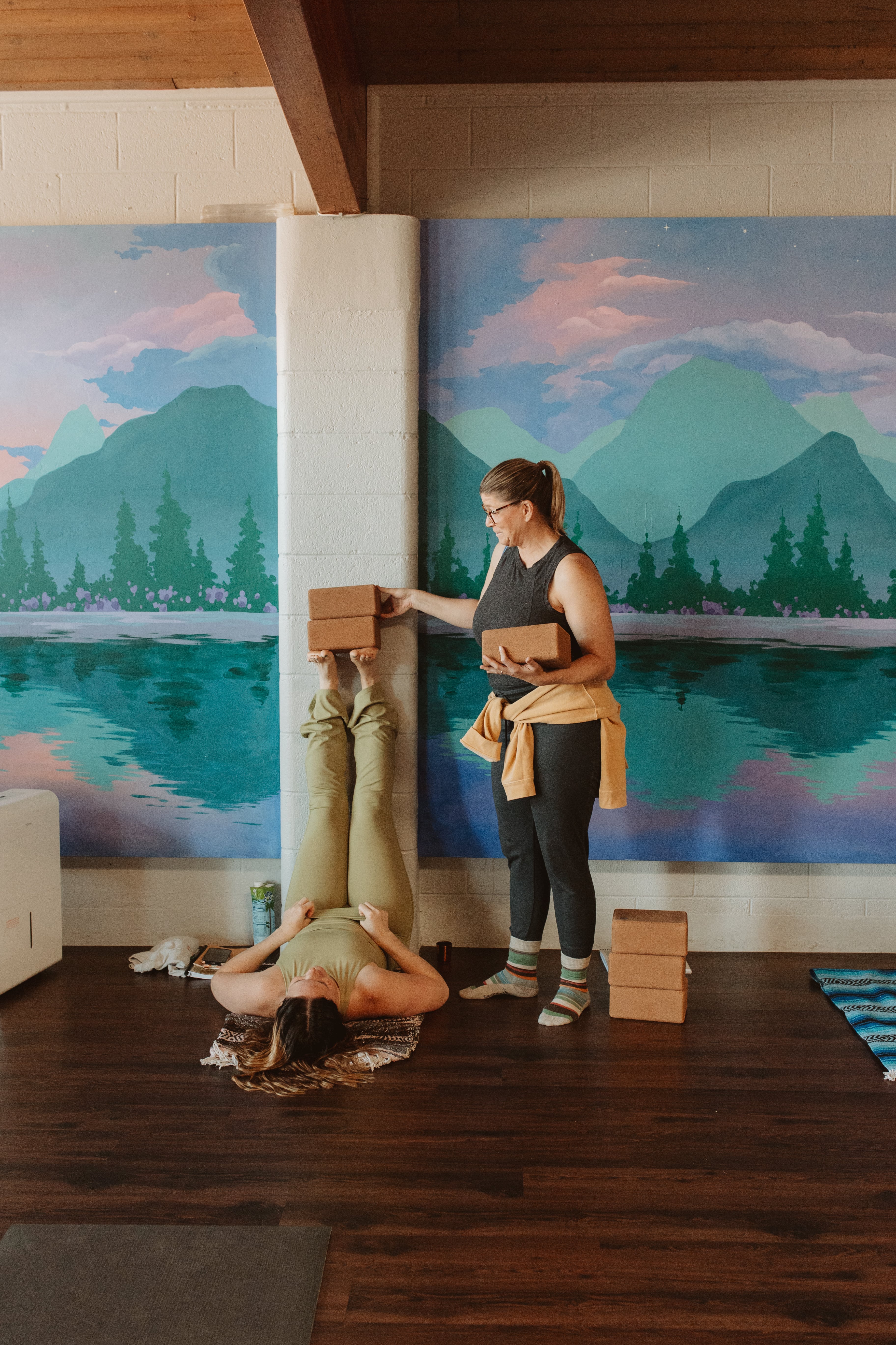 Using cork yoga blocks to aid in an inversion for children